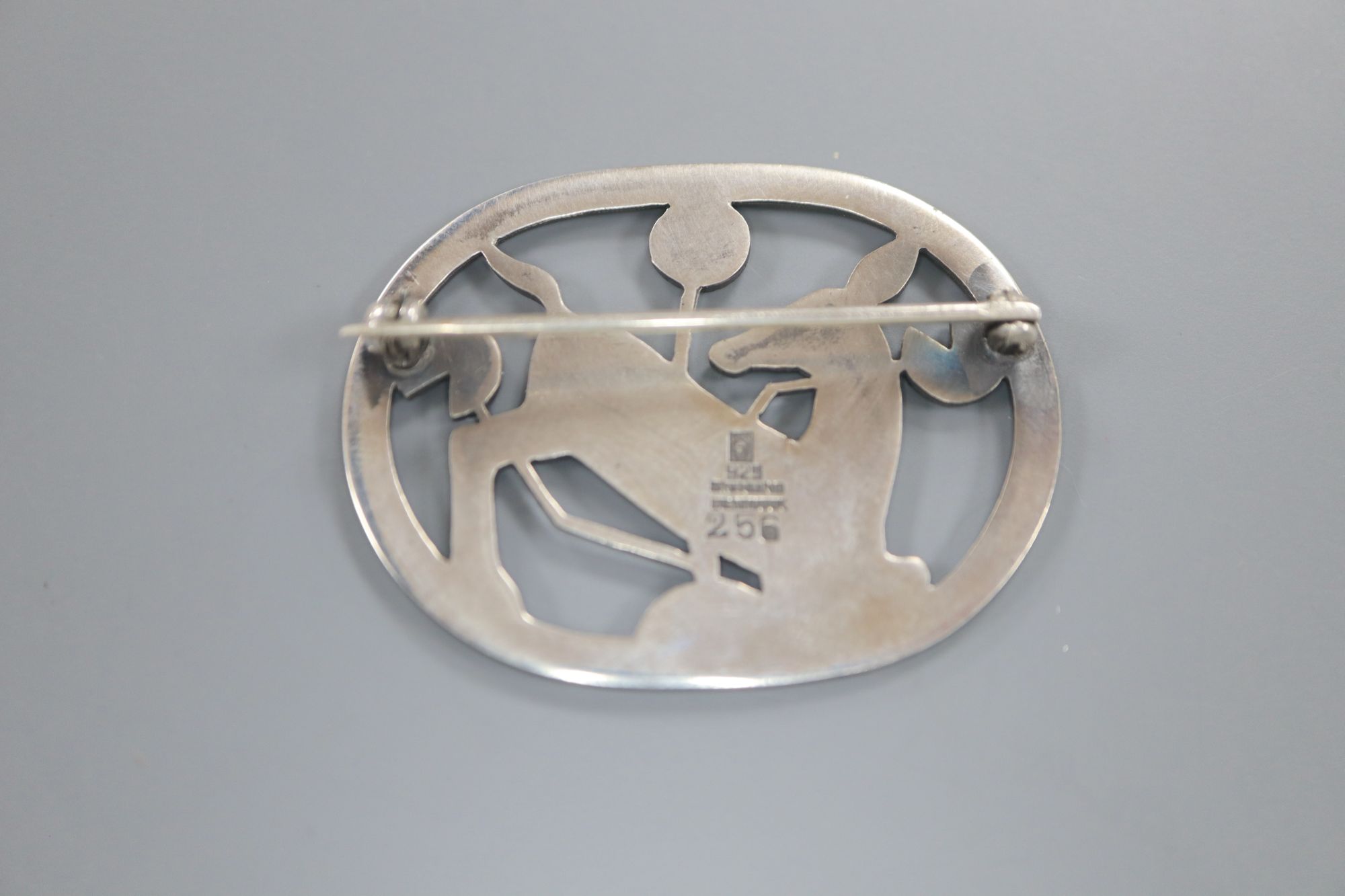 A Georg Jensen sterling Kneeling deer oval brooch, no. 256, 43mm.